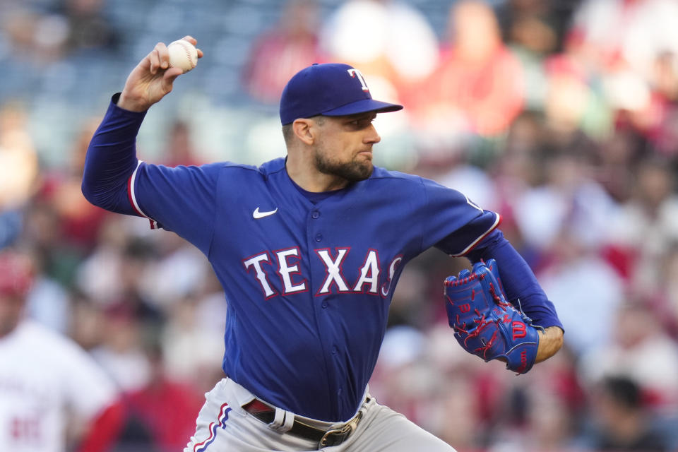 Texas Rangers starting pitcher Nathan Eovaldi throws against the Los Angeles Angels during the first inning of a baseball game Saturday, May 6, 2023, in Anaheim, Calif. (AP Photo/Jae C. Hong)