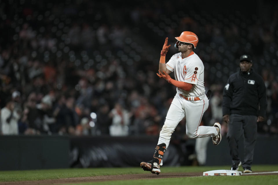 San Francisco Giants' Blake Sabol celebrates as he runs the bases on a solo home run against the Cleveland Guardians during the fifth inning of a baseball game Tuesday, Sept. 12, 2023, in San Francisco. (AP Photo/Godofredo A. Vásquez)