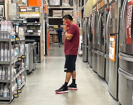 person in a store aisle