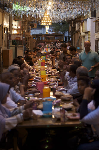 Festivities with friends and family take place within the home, parks, restaurants, and spill out onto side streets.