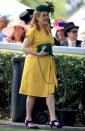 <p>Sarah Ferguson is seen at Royal Ascot wearing a vibrant yellow dress, which she paired with emerald accessories.</p>