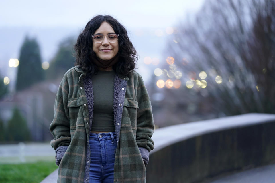 Daniela Murguia, of Renton, Wash., poses for a photo at a park in Kent, Wash., Sunday, Jan. 24, 2021, south of Seattle. Murguia's family brought her here from Mexico in 2008 when she was 11 and she has no legal status or protections. Immigrant rights activists energized by a new Democratic administration and majorities on Capitol Hill are gearing up for a fresh political battle to push through a proposed bill from Biden that would open a pathway to citizenship for up to 11 million people. (AP Photo/Ted S. Warren)