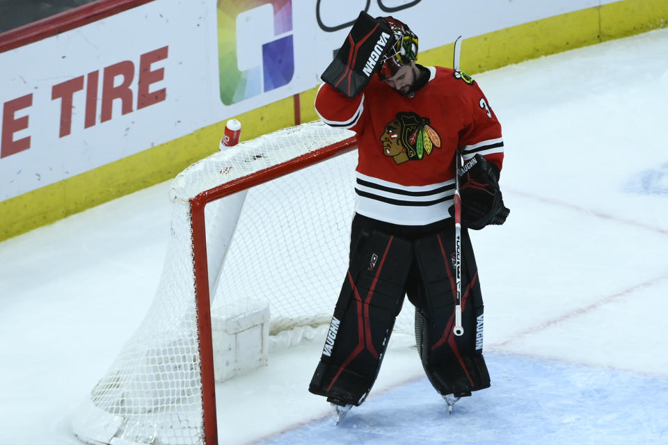 Chicago Blackhawks goaltender Petr Mrazek reacts after a goal was scored during the second period of an NHL hockey game against the Winnipeg Jets, Sunday, Nov. 27, 2022, in Chicago. (AP Photo/Matt Marton)