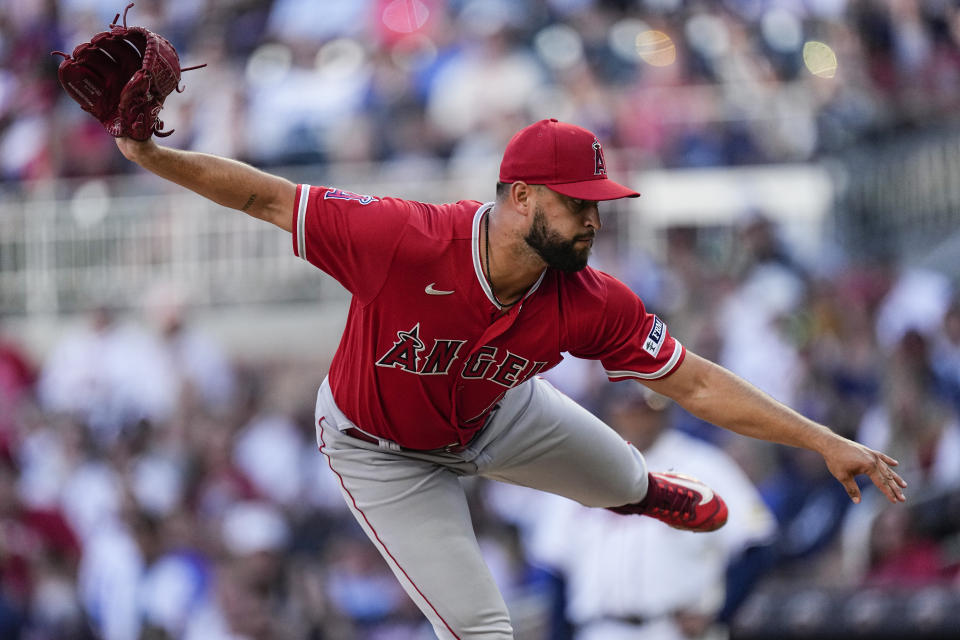 Los Angeles Angels starting pitcher Patrick Sandoval works against the Atlanta Braves in the first inning of a baseball game Tuesday, Aug. 1, 2023, in Atlanta. (AP Photo/John Bazemore)