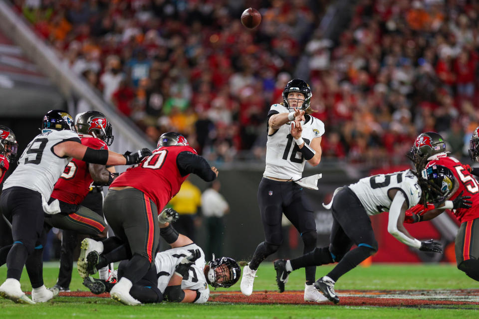 Dec 24, 2023; Tampa, Florida, USA; Jacksonville Jaguars quarterback Trevor Lawrence (16) throws a pass against the Tampa Bay Buccaneers in the third quarter at Raymond James Stadium. Mandatory Credit: Nathan Ray Seebeck-USA TODAY Sports