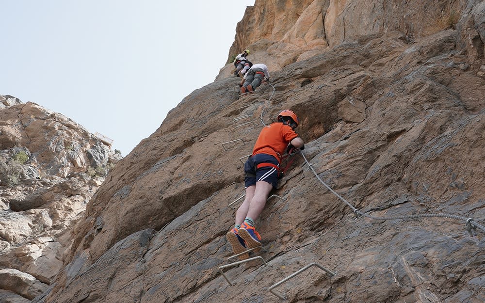Ben Parker on his way up the Jabal Akhdar via ferrata in Oman