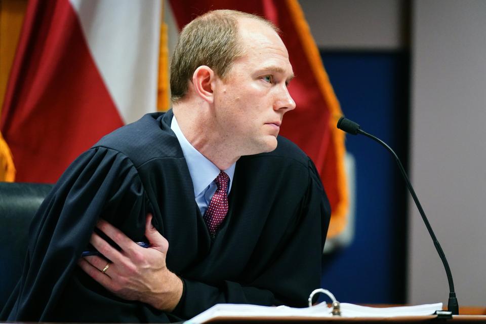 Fulton County Superior Court Judge Scott McAfee listens to arguments in the Georgia election interference case on 1 December. (EPA)