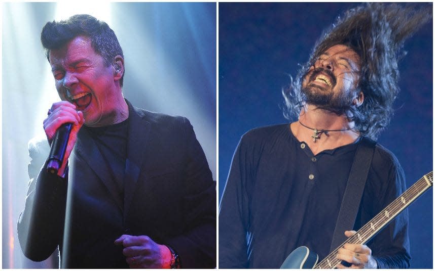 Rick Astley and Dave Grohl of the Foo Fighters in concert earlier this year, prior to their unexpected merging - Miranda Pitt/Andrew Benge/WireImage