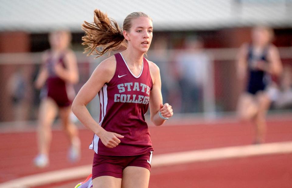 State College’s Grace Morningstar leads the 800 meter run during the District 6 3A track and field championships on Thursday, May 19, 2022 at Mansion Park.