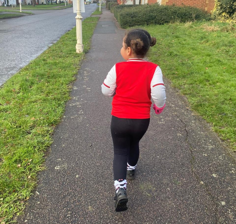 Peyton has chosen to run each day in her Arsenal shirt (Jack Davis/PA)