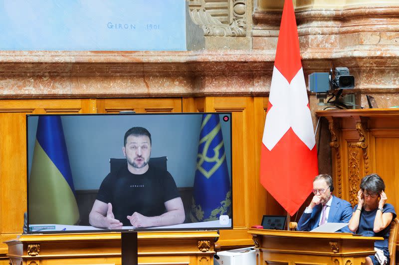 Ukraine's President Volodymyr Zelenskiy addresses Swiss Parliament via video message, in Bern