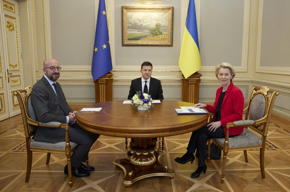 Ukrainian President Volodymyr Zelenskyy, center, European Commission President Ursula von der Leyen, right, and European Council President Charles Michel attend a Ukraine EU summit in Kyiv, Ukraine, Tuesday, Oct. 12, 2021. The 23rd summit between the European Union and Ukraine is held in Kyiv. (Ukrainian Presidential Press Office via AP)