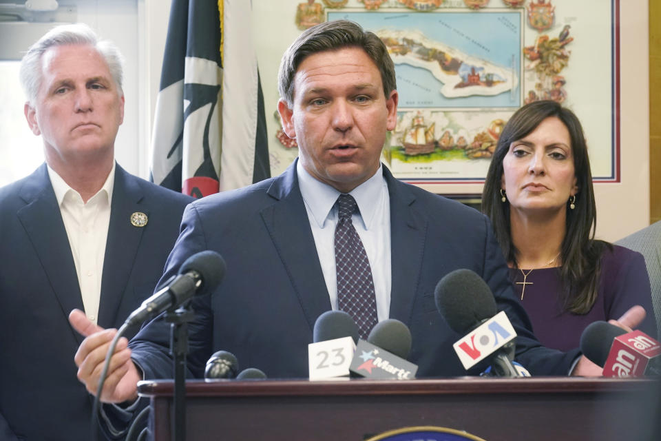 Florida Governor Ron DeSantis speaks at a news conference on Aug. 5, 2021, in Hialeah Gardens, Fla. To the left is House Minority leader Kevin McCarthy and to the right is Lt. Governor Jeanette Nunez. (Marta Lavandier/AP)