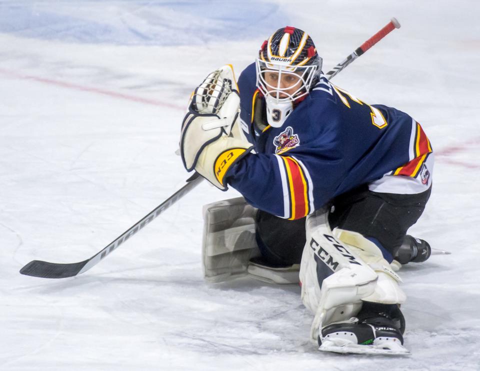 Rivermen goaltender Eric Levine catches the puck on a shot from Knoxville in the first period Friday, Jan. 13, 2023 at Carver Arena in Peoria. The Rivermen fell to the Ice Bears 6-4.