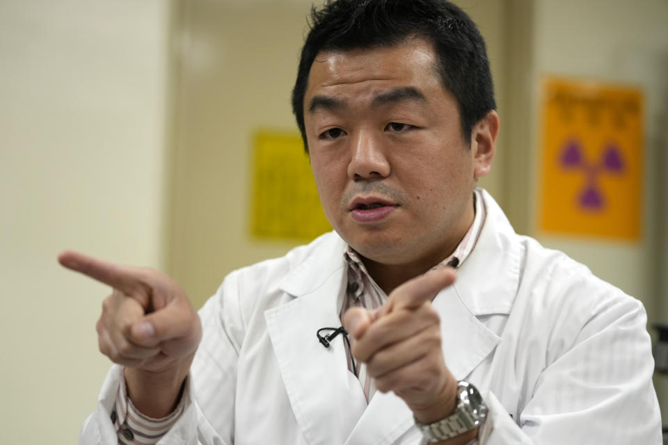 University of Tokyo radiologist Katsumi Shozugawa speaks during an interview with The Associated Press at the university in Tokyo on Feb. 16, 2023. Shozugawa said his analysis of groundwater in multiple locations in no-go zones near the plant has shown that tritium and other radioactive elements have been leaking into groundwater. (AP Photo/Shuji Kajiyama)