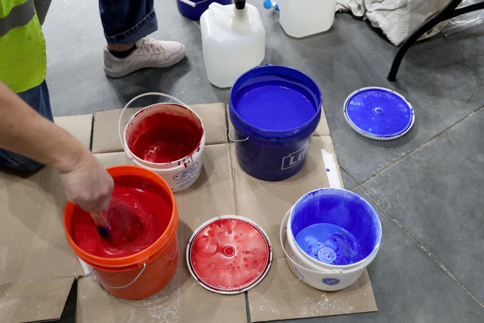 Icing and thin layers of paint begin inside Acrisure Arena, the home of the Coachella Valley Firebirds, hockey rink in Thousand Palms, Calif., on Tuesday, Dec. 6, 2022. 