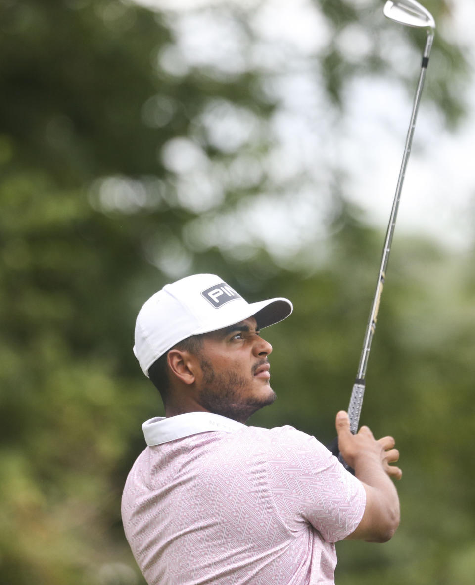 Sebastián Muñoz tees off on the 16th hole during the first round of the John Deere Classic golf tournament Thursday, July 8, 2021, in Silvis, Ill. (Jessica Gallahger/The Dispatch – The Rock Island Argus via AP)