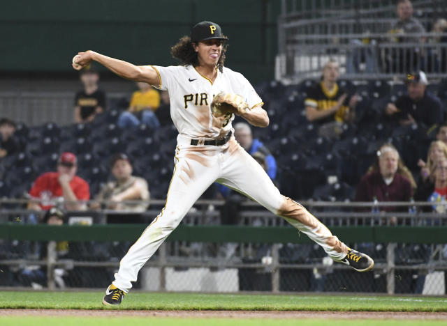 Tucker makes great grab, hits grand slam, Pirates beat Reds