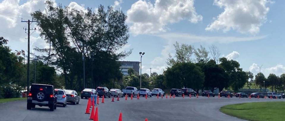 At Tropical Park, which serves as a drive-thru COVID testing and vaccine site, the line of cars went up to the park’s entrance at Southwest 79 Avenue and Bird Road Thursday morning, July 22, 2021.