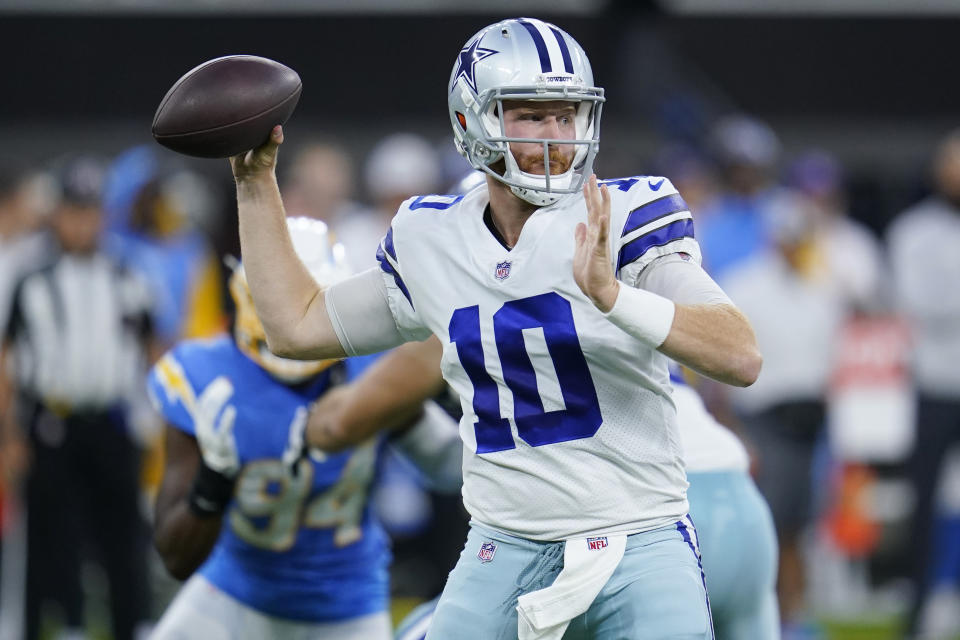 Dallas Cowboys quarterback Cooper Rush (10) throws during the first half of a preseason NFL football game against the Los Angeles Chargers Saturday, Aug. 20, 2022, in Inglewood, Calif. (AP Photo/Ashley Landis)