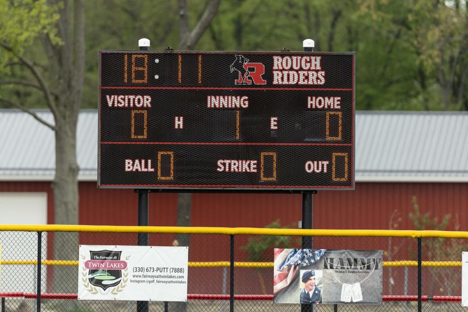The number 18 is displayed on the scoreboard in honor of David Starkey during the Kent Roosevelt Rough Riders home baseball game against the Ravenna Ravens Friday, May 3, 2024.