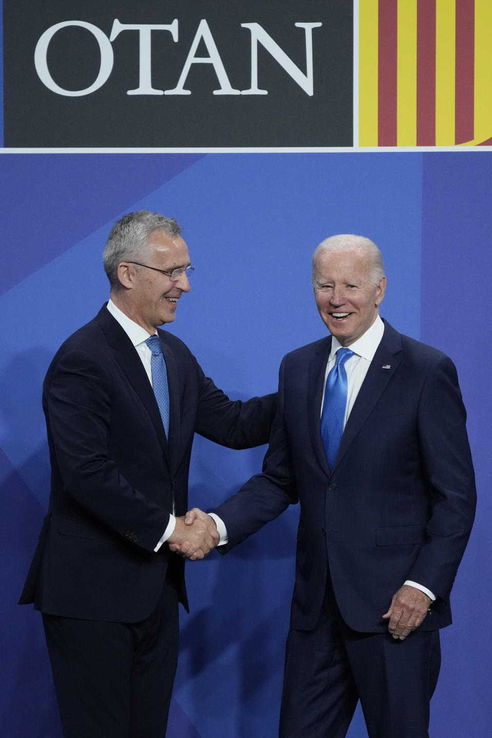 NATO Secretary General Jens Stoltenberg , left, welcomes U.S President Joe Biden during the NATO summit, Wednesday, June 29, 2022 in Madrid. North Atlantic Treaty Organization heads of state will meet for a NATO summit in Madrid from Tuesday through Thursday. (AP Photo/Christophe Ena, Pool)