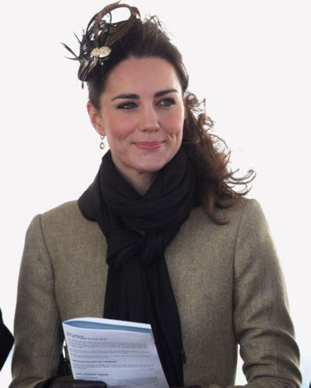 <p>Kate Middleton delighted in a smart brown coat and one of her signature festive headpieces, while the couple attended a dedication ceremony for a new vessel in the Royal Lifeboat Institution fleet in North Wales in <a href="https://parade.com/living/february-holidays-observances" rel="nofollow noopener" target="_blank" data-ylk="slk:February" class="link ">February</a> 2011.</p>