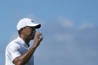 December 1, 2017; New Providence, The Bahamas; Tiger Woods acknowledges the crowd after making his putt on the first hole during the second round of the Hero World Challenge golf tournament at Albany. Kyle Terada-USA TODAY Sports