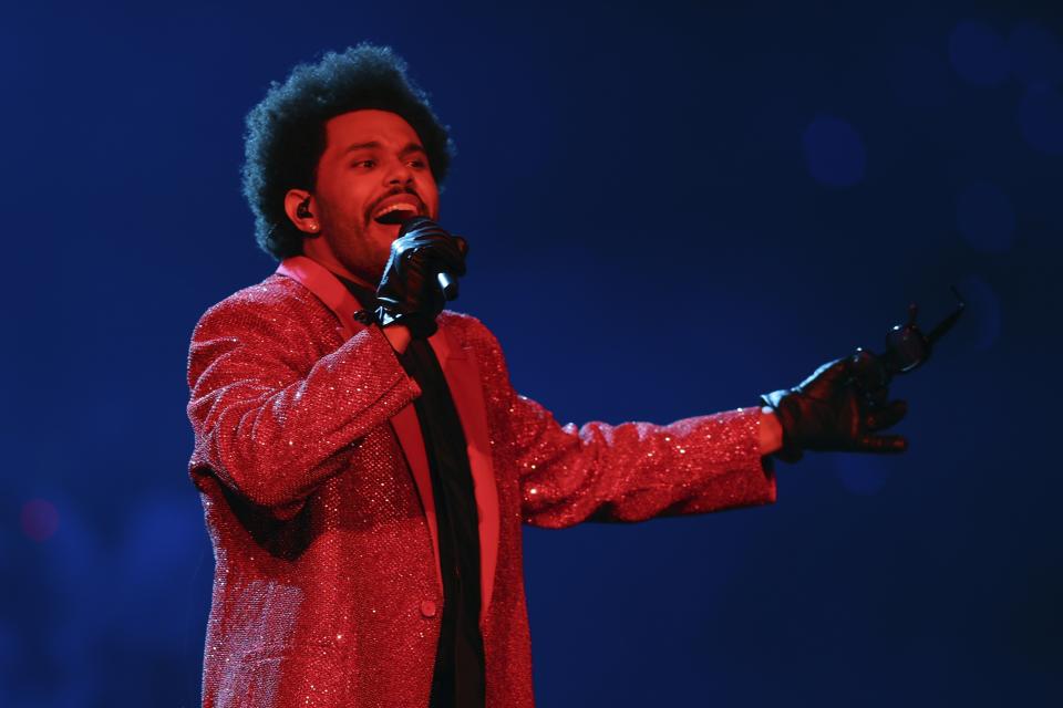 The Weeknd performs during the halftime show of the NFL Super Bowl 55 football game between the Kansas City Chiefs and Tampa Bay Buccaneers, Sunday, Feb. 7, 2021, in Tampa, Fla. (AP Photo/Chris Carlson)