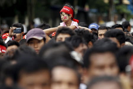 People wait to pay respect during an event marking the anniversary of Martyrs' Day outside the Martyrs' Mausoleum in Yangon July 19, 2015. REUTERS/Soe Zeya Tun