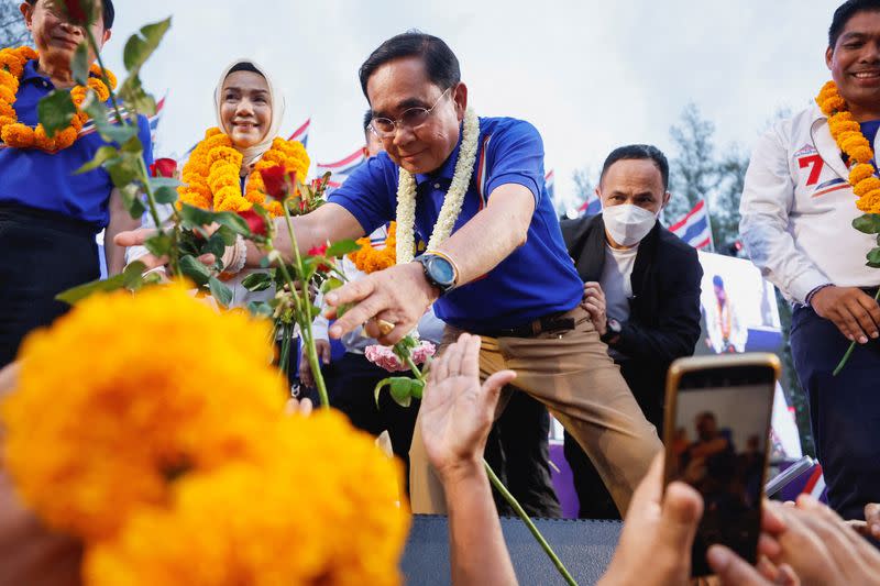 FILE PHOTO: Embattled Thai PM Prayuth fights to stay on in vote on Sunday