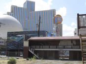 This photograph taken Wednesday, Aug. 29, 2018 in downtown Reno, Nevada shows one of the old motor lodges that have been shuttered and slated for demolition. Weekly motels increasingly are becoming the last stop before homelessness for hundreds of working families who can't afford to live anyplace else. An economic boom spurred by the arrival of thousands of new employees at Tesla, Google, Apple and other corporate giants has created an unprecedented housing crisis in the area. (AP Photo/Scott Sonner).