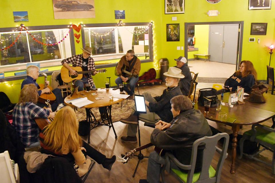 Members of the CenLa Songwriters Circle gather at Fighting Hand Brewing Company in Pineville. Songwriters gather at the brewery at 6 p.m. the first Wednesday of every month.