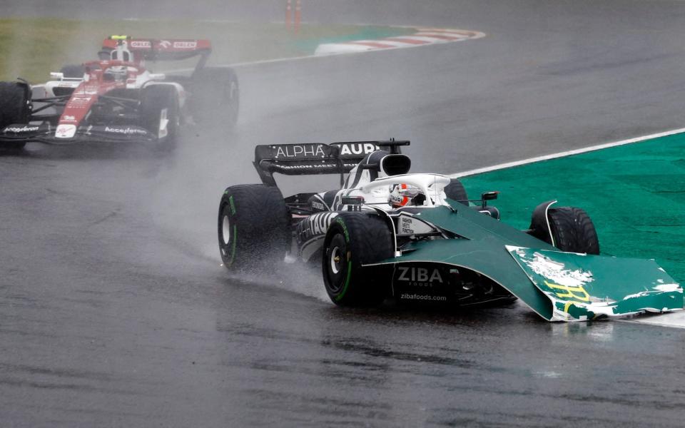 Japanese Grand Prix - Suzuka Circuit, Suzuka, Japan - October 9, 2022 AlphaTauri's Pierre Gasly in action during the race with boarding appearing on the ca - REUTERS