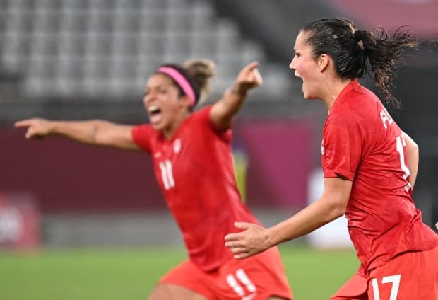 Jessie Fleming, right, celebrates after scoring the opening goal for Canada during the Tokyo 2020 Olympic Games women's semifinal soccer match on Monday. (Martin Bernetti/AFP via Getty Images - image credit)