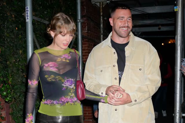 <p>Gotham/GC Images</p> Taylor Swift and Travis Kelce at Waverly Inn on October 15, 2023 in New York City.