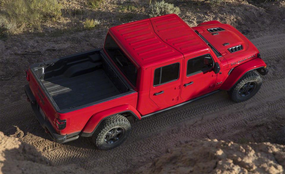 <p>The frame measures 30.6 inches longer than that which underpins the current Wrangler JL four-door and gives the Gladiator a 137.3-inch wheelbase, a considerable 19.9 inches longer than that of the Wrangler JL 4-door; as you can see here, it also <em>looks</em> a lot longer than the Wrangler.</p>