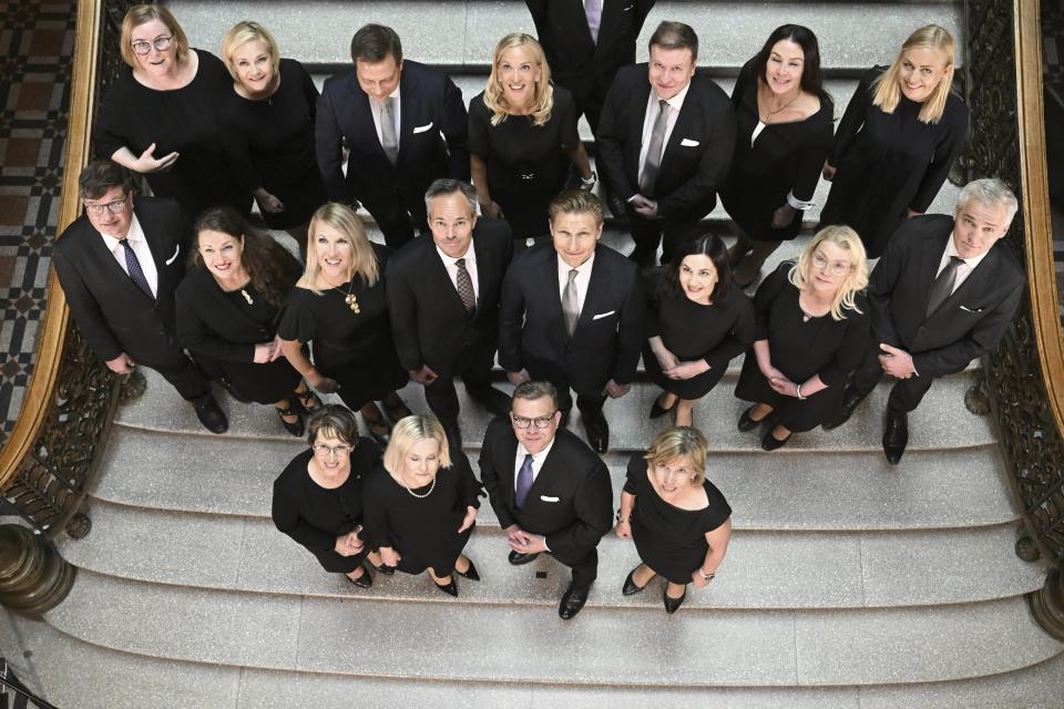 The new Government of Finland led by Prime Minister Petteri Orpo pose for a family picture in Helsinki, Finland on Tuesday, June 20, 2023. First row, from left, Minister of Agriculture and Forestry Sari Essayah, Minister of Finance Riikka Purra, Prime Minister Petteri Orpo and Minister of Education Anna-Maja Henriksson. Second row, from left, Minister of Labour (split into two-year posts) Arto Satonen, Minister for Local and Regional Government Anna-Kaisa Ikonen, Minister for Culture and Science (split into two-year posts) Sari Multala, Minister of the Environment and Climate Change Kai Mykk'nen, Minister of Defence Antti H'kk'nen, Minister for Social Security Sanni Grahn-Laasonen, Minister of Justice Leena Meri and Minister for Europe and Corporate Governance Anders Adlercreutz. Third row, from left, Minister of Social Affairs and Health Kaisa Juuso, Minister of the Interior Mari Rantanen, Minister of Economic Affairs (divided into two-year posts) Vilhelm Junnila, Minister for Sport, Physical Acticity and Youth (split between the SPP and CD for two-year posts) SPP's Sandra Bergqvist, Minister for Foreign Trade and Development Ville Tavio, Minister for Transport and Communications Lulu Ranne and Minister for Foreign Affairs Elina Valtonen. (Jussi Nukari/Lehtikuva via AP)