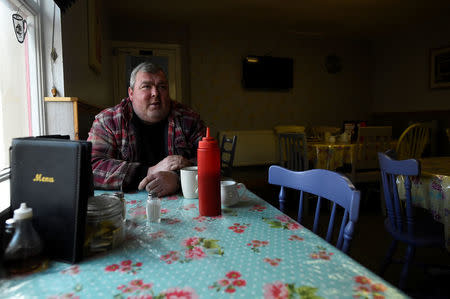 David McClintock from Donegal sits in the 'Border Cafe' in the border village of Muff, Ireland, February 1, 2018. REUTERS/Clodagh Kilcoyne