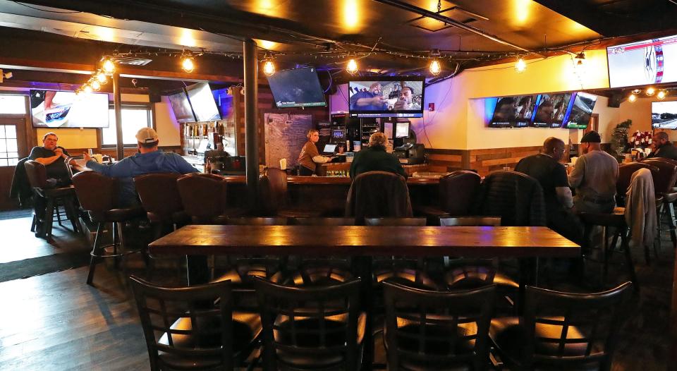 The Basement Bar and Grill in Akron has plenty of TVs to watch the big game.