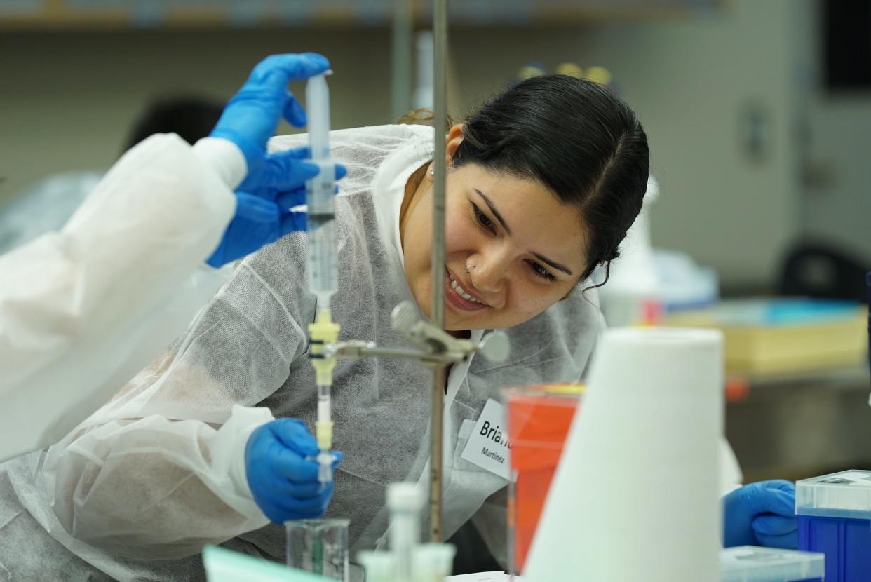 A Moorpark College student works in a biotech lab in this undated photo.