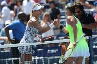 Sep 4, 2016; New York, NY, USA; Lesia Tsurenko of Ukraine (L) congratulates Roberta Vinci of Italy (R) on her win on day seven of the 2016 U.S. Open tennis tournament at USTA Billie Jean King National Tennis Center. Mandatory Credit: Anthony Gruppuso-USA TODAY Sports