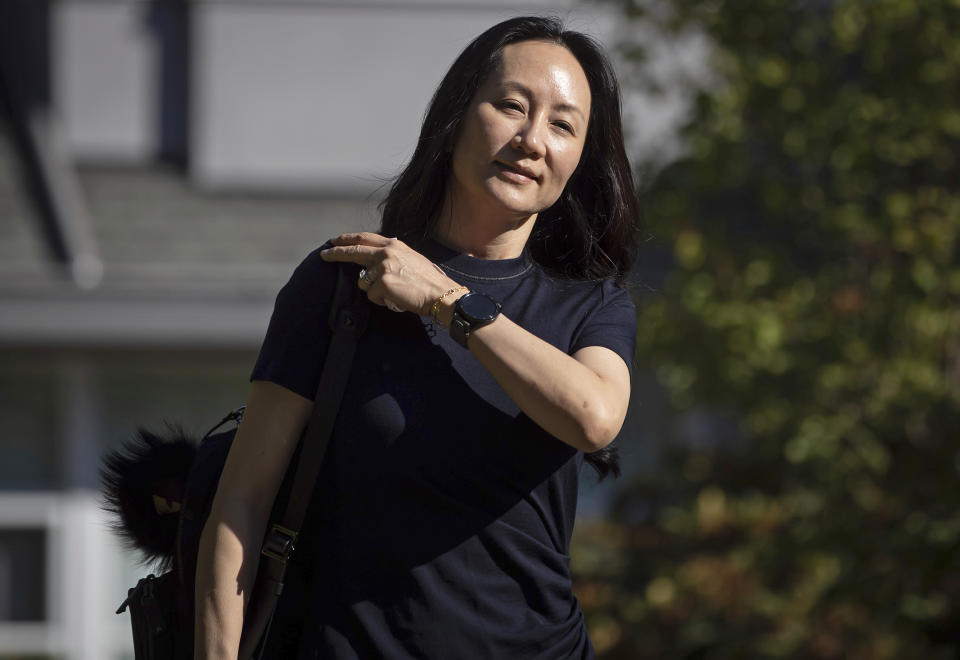 Meng Wanzhou, chief financial officer of Huawei, leaves home to attend her extradition hearing at B.C. Supreme Court, in Vancouver, British Columbia, Thursday, Aug. 5, 2021. (Darryl Dyck/The Canadian Press via AP)