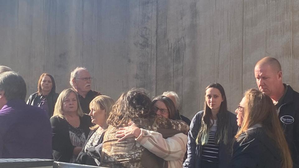 Cathy Pearson (middle), the mother of Thomas Coutee Jr., hugs a supporter Saturday outside the Rapides Parish Courthouse. Coutee's estranged wife, Kayla Giles, was found guilty in his 2018 shooting death.