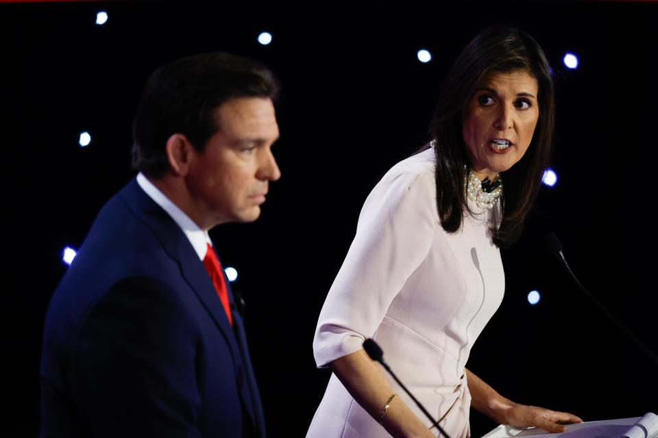 DES MOINES, IOWA - JANUARY 10: Republican presidential candidates Florida Gov. Ron DeSantis and former U.N. Ambassador Nikki Haley participate in the CNN Republican Presidential Primary Debate in Sheslow Auditorium at Drake University on January 10, 2024 in Des Moines, Iowa. DeSantis and Haley both qualified for this final debate before the Iowa caucuses, while former President Donald Trump declined to participate and instead held a simultaneous town hall event live on FOX News. (Photo by Chip Somodevilla/Getty Images)