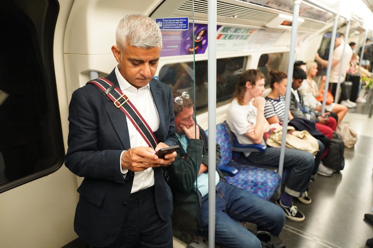 Sadiq Khan on the Tube (PA)