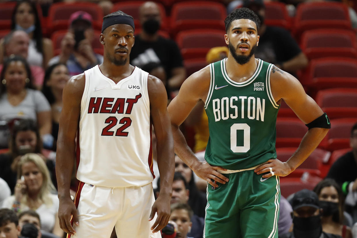 Jimmy Butler's Miami Heat and Jayson Tatum's Boston Celtics meet in the Eastern Conference finals for the third time in four years. (Michael Reaves/Getty Images)