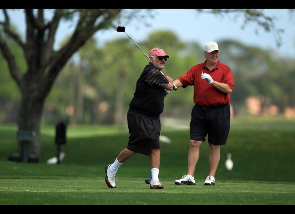 WEST PALM BEACH, FL - MARCH 21:  Marvin Shanken tees off watched by Rush Limbaugh the Radio Presenter during the Els for Autism Pro-am at The PGA National Golf Club on March 21, 2011 in West Palm Beach, Florida.  (Photo by David Cannon/Getty Images)