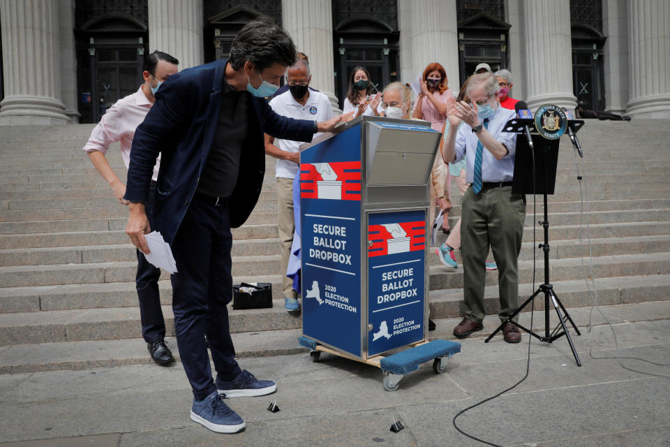 New York State Sen. Brad Hoylman (left) unveils a secure ballot drop box along with other local leaders on Aug. 31 as they rally outside the James A. Farley U.S. Postal Service building for their new legislation that would to allow local Boards of Elections to establish absentee ballot drop box locations across the state. (Photo: Mike Segar / Reuters)