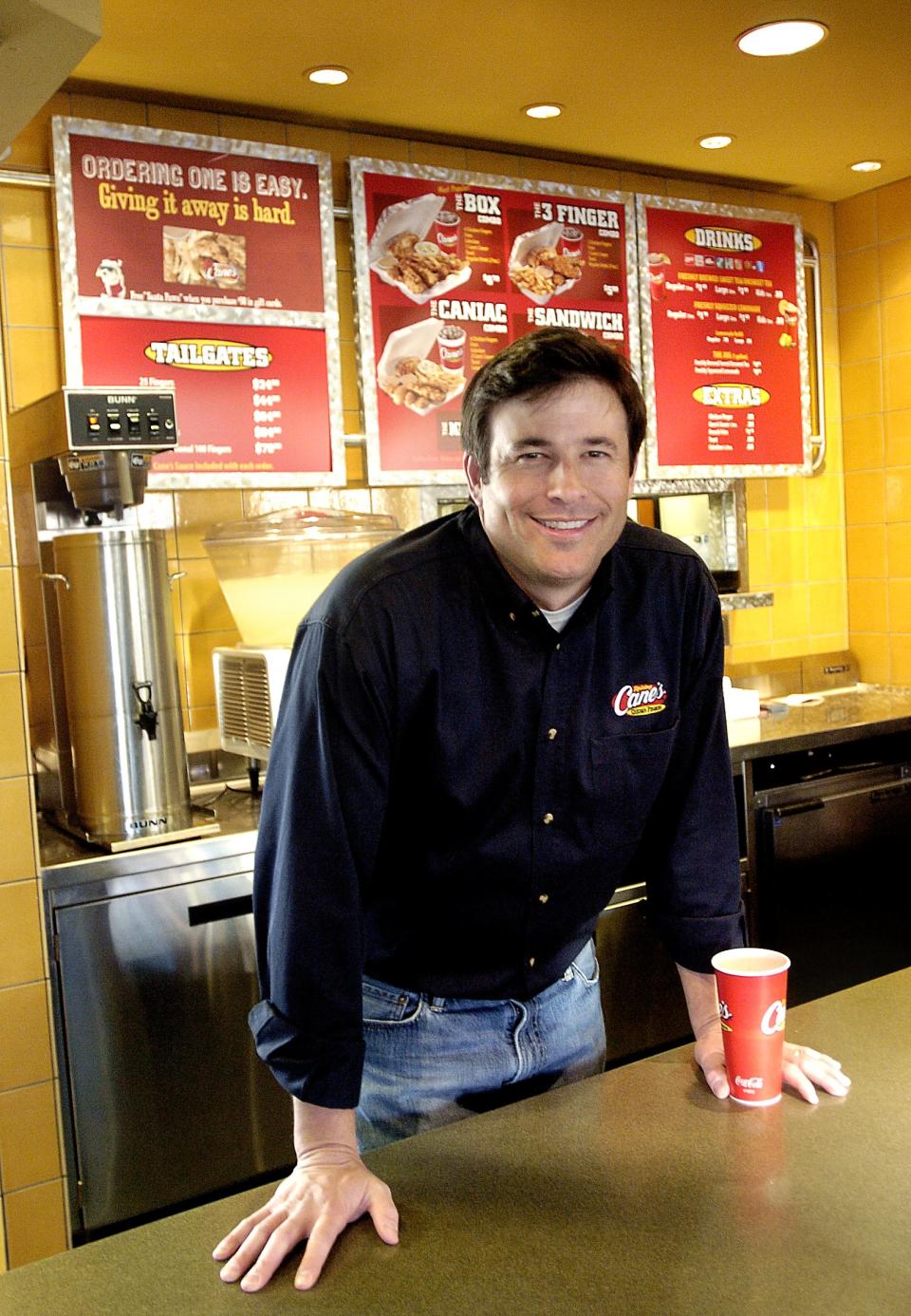 Todd Graves, founder of Raising Canes, poses for a photo inside the restaurant n Shreveport in 2008.